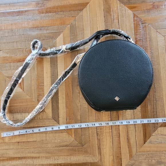 Call It Spring Handbags - 🆕️NWT Call It Spring - Round Black Purse - (Never Used)